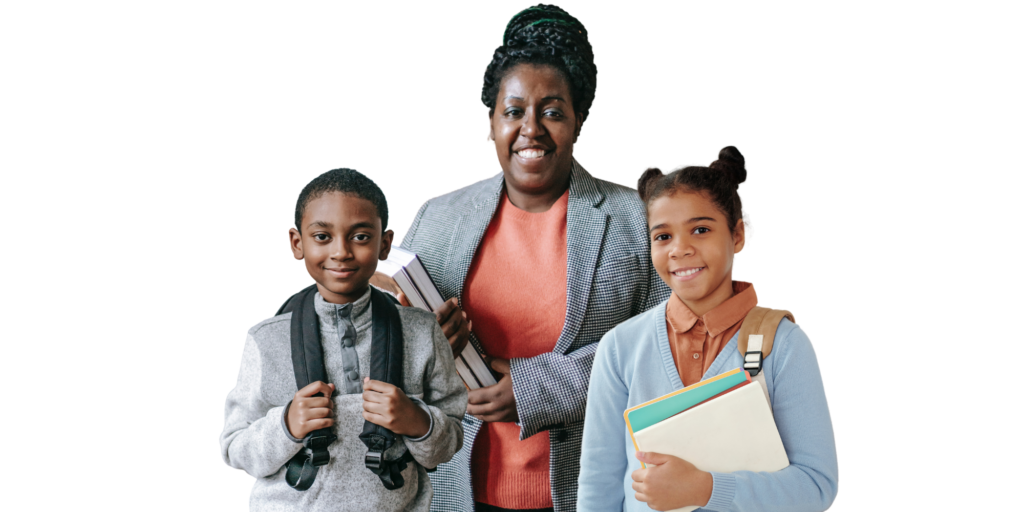 Black woman CS teacher alongside two of her elementary students, all smiling